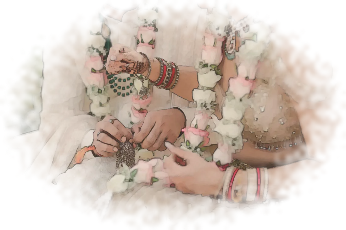 Bride and groom wearing jaimala garlands